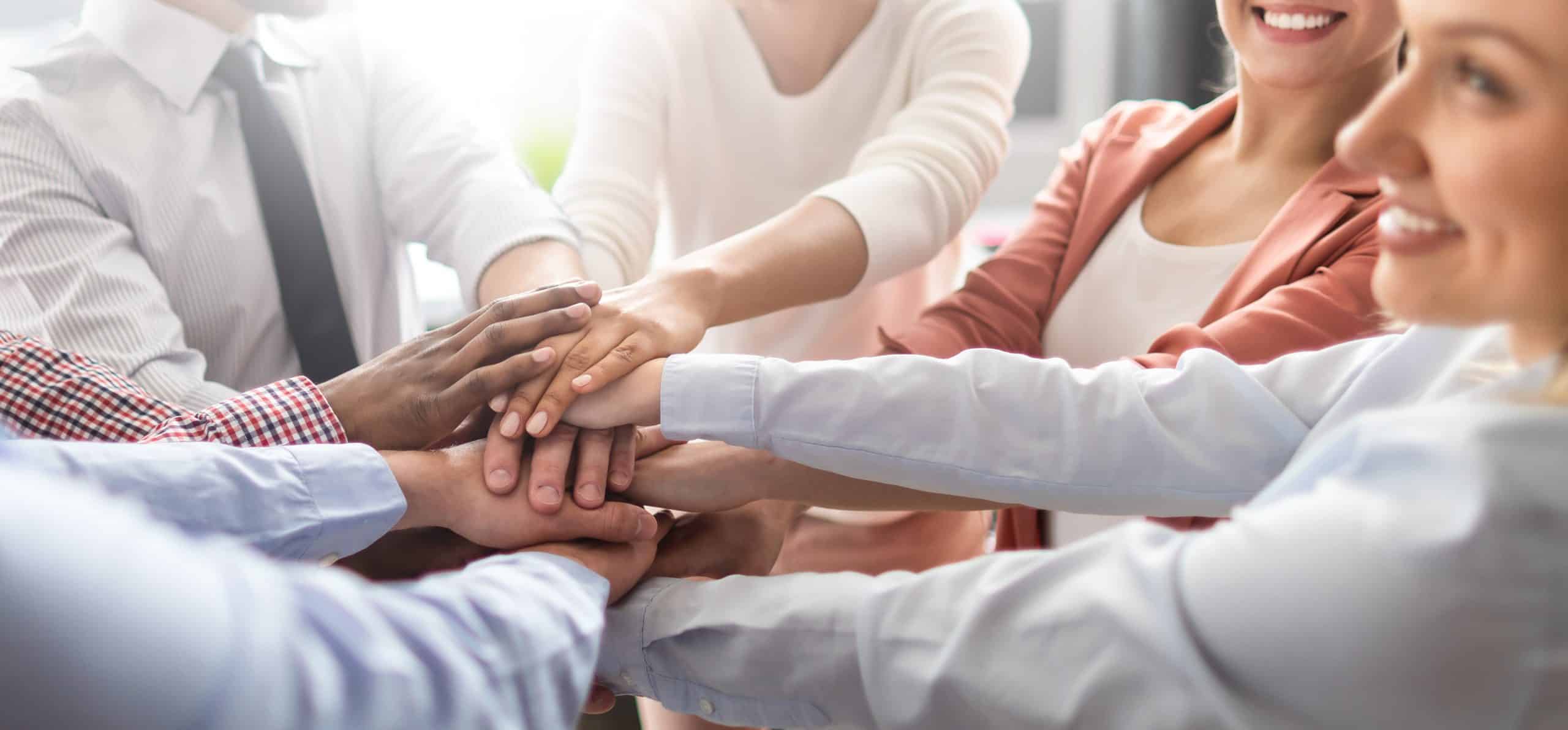 Stack of hands. Unity and teamwork concept.