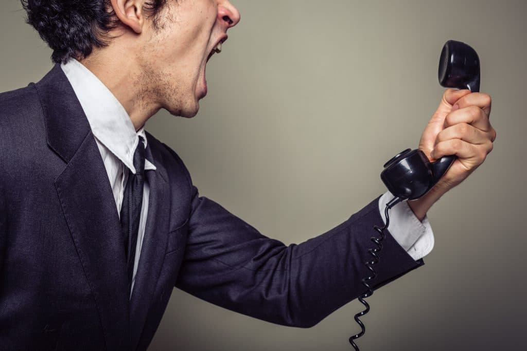 Angry businessman on the phone