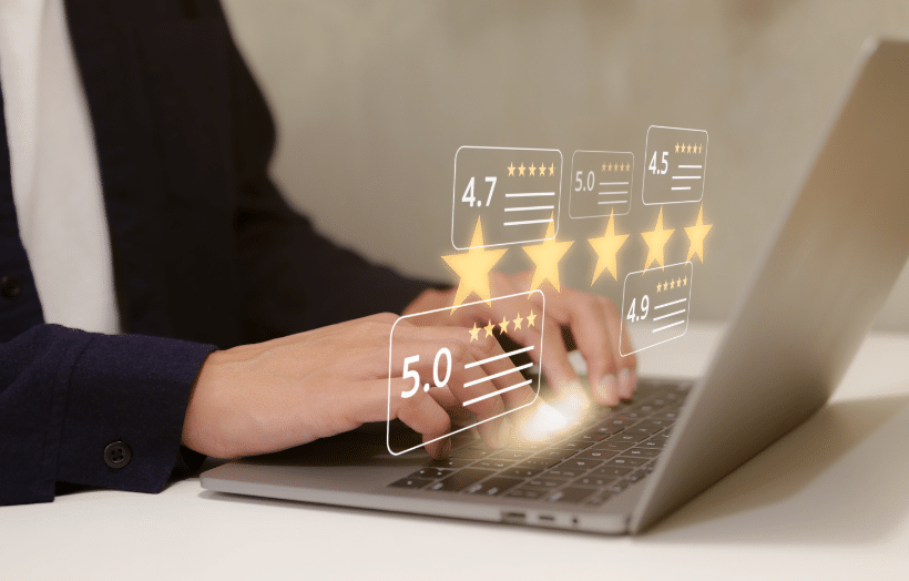 Person at laptop with five-star customer satisfaction ratings floating above screen