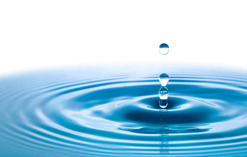 Water droplet creating ripple effect illustrating how investing in people transforms lives and communities
